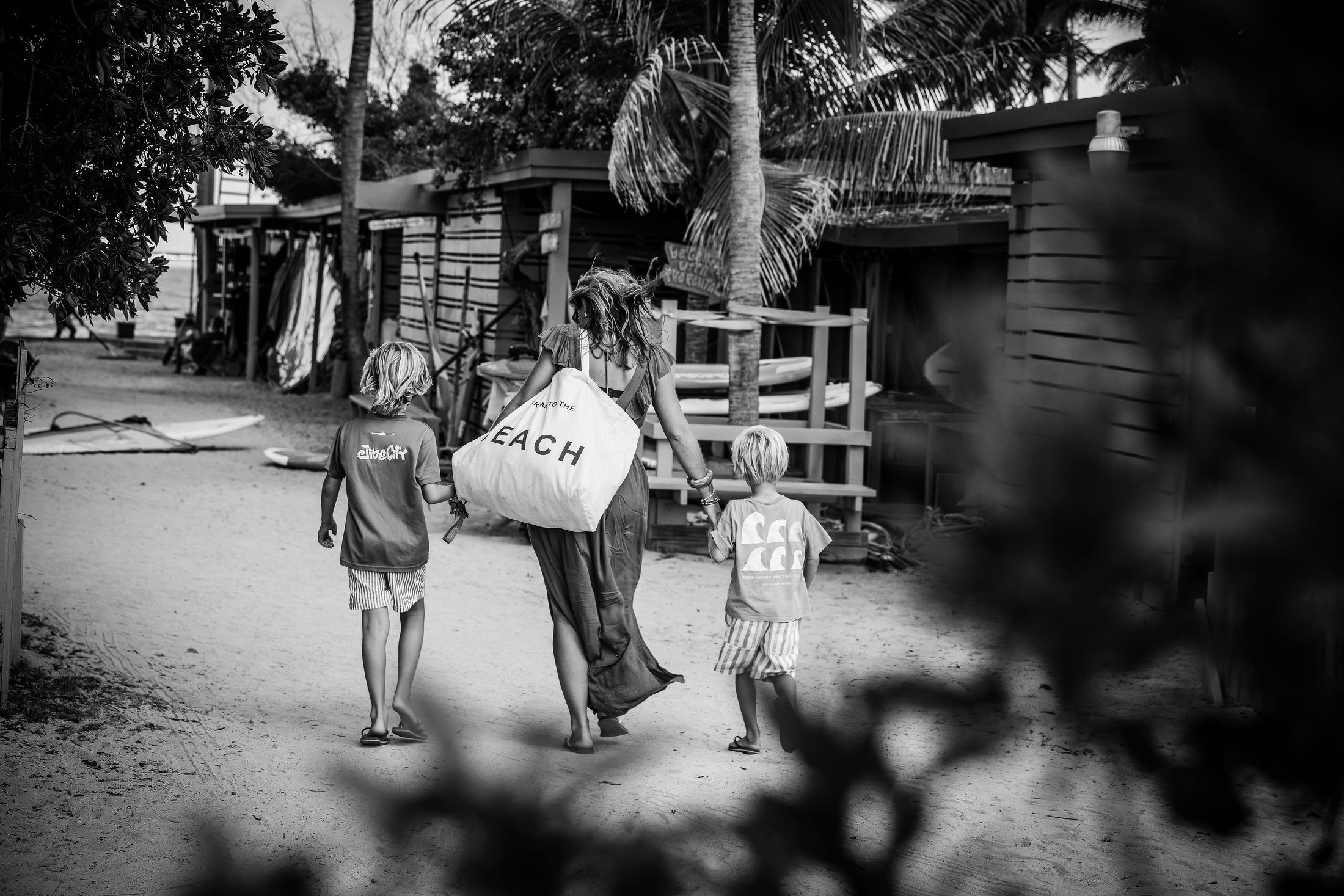 Jurinda walking to the beach hand in hand with her two sons