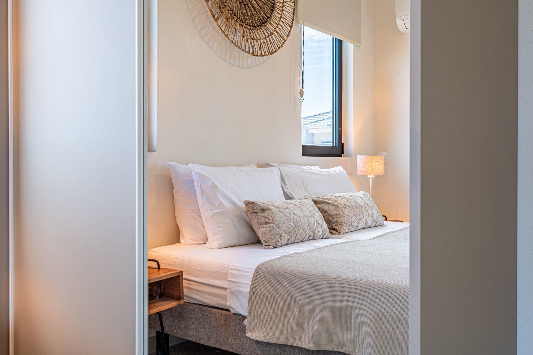 Bedroom with natural styling at Kaya Sirena