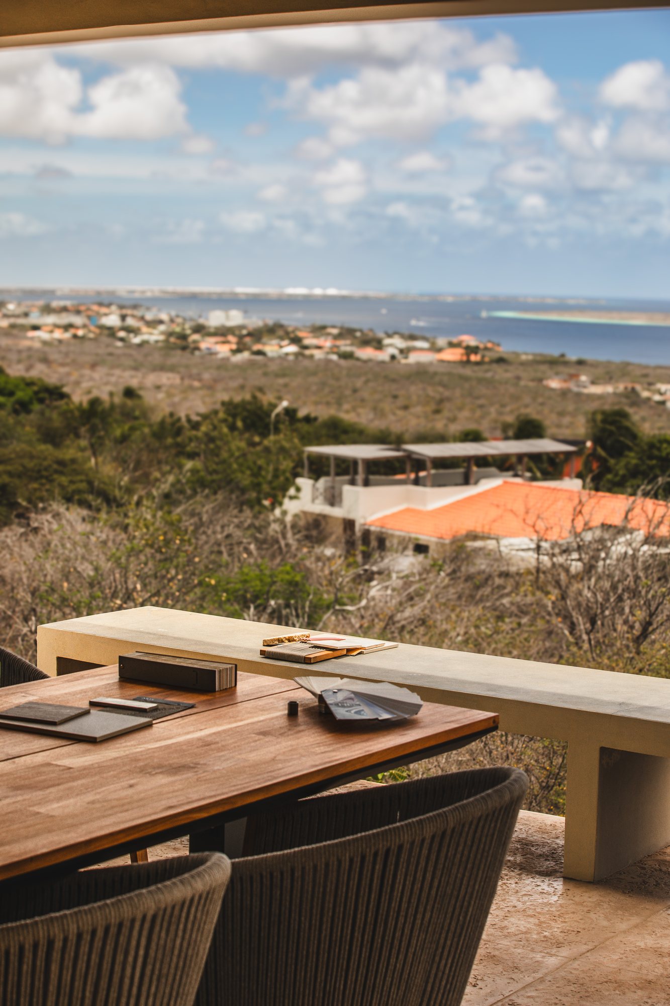 Sample boards on the table, looking out over Bonaire